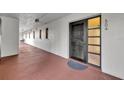 Exterior hallway with unit number and door to unit number 304 at 100 S Interlachen Ave # 304, Winter Park, FL 32789