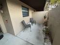 Relaxing outdoor patio area with seating, plants, and a peaceful atmosphere at 2284 Firestone Pl, Winter Haven, FL 33884