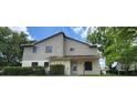 Inviting two-story home showcasing neat landscaping and a well-kept facade at 658 Olympic Dr, Ocoee, FL 34761