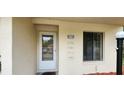 Welcoming front entryway with a glass paneled door and adjacent window providing ample natural light at 658 Olympic Dr, Ocoee, FL 34761