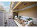 Cozy backyard patio with comfortable seating and manicured landscaping, perfect for outdoor relaxation and entertaining guests at 1132 Hardy Ave Ave, Orlando, FL 32803