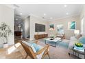 Open-concept living room offers stylish furnishings, modern decor, and seamless flow, perfect for relaxing and socializing at 1132 Hardy Ave Ave, Orlando, FL 32803