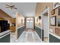 Inviting foyer features tile flooring, neutral walls, and an attractive front door that enhances the home's entry appeal at 13506 Crystal River Dr, Orlando, FL 32828