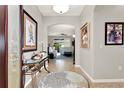 Bright foyer featuring tile floors and decor, flowing into the living space at 1382 Hayton Ave, Deland, FL 32724