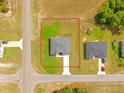 Aerial view showcases this property's layout within a well-maintained neighborhood, surrounded by green spaces at 2436 Sw 155Th Ln, Ocala, FL 34473