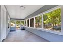 Bright sunroom featuring multiple windows providing ample natural light at 1029 Colyer St, Orlando, FL 32805