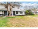 Charming two-story home with landscaped front yard and inviting entrance at 2635 Graduate Ct, Orlando, FL 32826