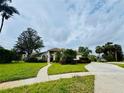 Beautiful single-Gathering home on a large lot with mature trees and lush landscaping, offering great curb appeal at 450 Blue Smoke Ct, Lake Mary, FL 32746