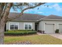 Beautiful single-story home with neatly trimmed landscaping and an attached garage at 3632 Solana Cir # B, Clermont, FL 34711