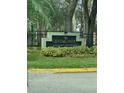 Community sign for Central Park, a Metrowest Condominium complex, with trees in the background at 6100 Westgate Dr # 203, Orlando, FL 32835