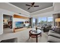 Bright living room with balcony access offering stunning views at 7613 Cabana Ct # 402, Reunion, FL 34747