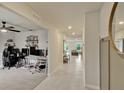 Spacious entryway with tile floors leading to a living room at 5663 Keaton Springs Dr, Lakeland, FL 33811