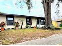 Street view of home showcasing front lawn and landscaping at 722 Eagle Ave, Longwood, FL 32750