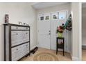 Inviting foyer featuring a decorative tile floor and ample storage space at 910 Florida Blvd, Altamonte Springs, FL 32701