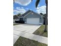 A well maintained, single-story home with an attached two-car garage at 636 Bohannon Blvd, Orlando, FL 32824