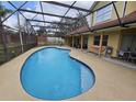 Relaxing screened in pool with deck, hammock, and plenty of space to relax at 6630 Abeydon Ct, Orlando, FL 32818