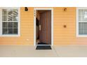 Inviting entryway with open door and view of the interior at 506 New Providence Promenade # 506, Davenport, FL 33897