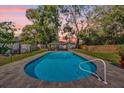 Inviting backyard pool with a gazebo, perfect for outdoor relaxation at 615 Pershing Dr, Altamonte Springs, FL 32701