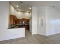 Open floor plan featuring a kitchen with stainless steel appliances and high ceilings at 2634 Rutledge Ct, Winter Haven, FL 33884