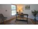 Dedicated office space bathed in natural light, perfect for remote work at 1285 Oak Dr, Mount Dora, FL 32757