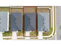 Birds-eye view of the home with a dark roof and minimal backyard landscaping in a neighborhood at 1760 Astrid Rd, Davenport, FL 33837