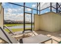 Private outdoor pool area with comfortable lounge chairs and tranquil water view at 4841 Romeo Cir, Kissimmee, FL 34746