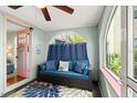 Comfortable porch setup with stylish seating and a view of the outdoors at 7 Clarendon Ct, Daytona Beach, FL 32118