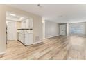 Bright and airy living room with modern flooring, neutral paint, and ample natural light at 225 Ranier Cv # 105, Casselberry, FL 32707