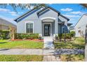 Charming single Gathering home with a well maintained lawn and a welcoming front entrance at 3320 Ashmount Dr, Orlando, FL 32828