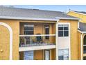 Exterior view of a condo balcony with furniture at 5255 Images Cir # 305, Kissimmee, FL 34746