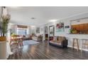 Spacious living room with hardwood floors, neutral colors, and ample natural light at 119 Mayfair Cir, Sanford, FL 32771