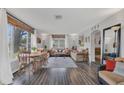 Open-concept living room featuring abundant natural light and comfortable furnishings at 119 Mayfair Cir, Sanford, FL 32771