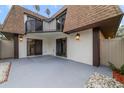 Private back patio with gray painted concrete and exterior access to the home at 4036 Shannon Brown Dr, Orlando, FL 32808