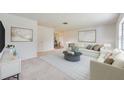Bright and airy living room featuring neutral tones and ample natural light at 858 Darwin Dr, Altamonte Springs, FL 32701