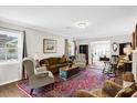 Inviting living room boasting a classic rug and traditional furnishings at 2251 Chippewa Trl, Maitland, FL 32751