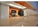 Modern kitchen featuring stainless steel appliances, granite countertops, and recessed lighting for a contemporary touch at 2734 Cattail Ct, Longwood, FL 32779