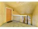 The porch area with door, with a railing, and a view of the community at 5291 Images Cir # 302, Kissimmee, FL 34746