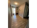 Inviting foyer showcasing tiled floors and a view of the front door at 307 N Oak Ave, Fort Meade, FL 33841