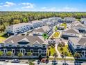 Aerial view of townhome community, showcasing the layout, landscaping, and convenient parking at 1194 Spotted Sandpiper Loop, Winter Springs, FL 32708