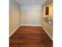 Dining area with hardwood floors and a pass-through to the kitchen at 2019 Dixie Belle Dr # 2019O, Orlando, FL 32812