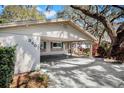 Attached covered two-car carport on this charming home at 3407 Pershing Ave, Orlando, FL 32812