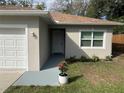 Charming home with a front yard, a new roof, and fresh landscaping at 424 Crabtree Ave, Orlando, FL 32835