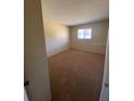 Bedroom featuring neutral carpet, and a bright window, creating a cozy and inviting space at 725 Northlake Blvd # 66, Altamonte Springs, FL 32701