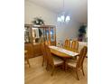 Formal dining room with wood floors, a chandelier, and plenty of space for entertaining at 9 Escondido Cir # 88, Altamonte Springs, FL 32701