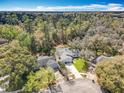 Beautiful aerial view of a landscaped home with a spacious backyard at 302 Log Run Ct, Ocoee, FL 34761