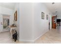 Inviting entryway with tile flooring, neutral walls, and a decorative table at 8924 Azalea Sands Ln # 8924, Davenport, FL 33896