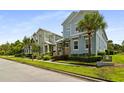 Street view showcasing a row of well-maintained homes with lush green lawns and landscaping at 1511 Fairview Cir, Kissimmee, FL 34747