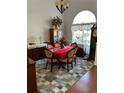 Formal dining room features a chandelier and large window at 3220 Town And Country Rd, Oviedo, FL 32766