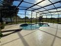 Beautiful screened-in pool with spacious deck, perfect for outdoor entertaining and relaxation at 4113 Golden Willow Cir, Apopka, FL 32712