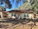 Charming single-story home with a covered front entry at 7002 Rose Ave, Orlando, FL 32810